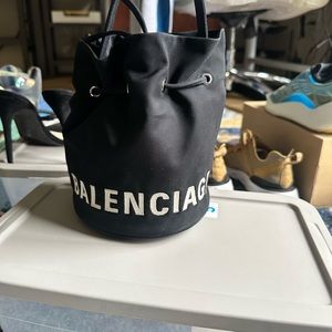 Balenciaga bucket bag comes with cross body strap